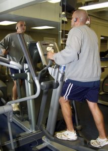 old man doing workout